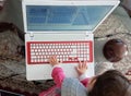 Keyboard baby laptop first steps red Royalty Free Stock Photo