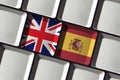 Keyboard with British United Kingdom and Spanish Spain flag language learning,