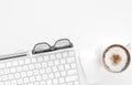 Keyboard, coffee cup, glasses, pen and pencil on white office desk table, top view, copy space, 3d rendering Royalty Free Stock Photo