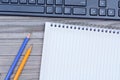 Keyboard computer with notepad and pencil Royalty Free Stock Photo