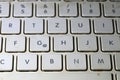 Keyboard on a dirty white laptop Royalty Free Stock Photo