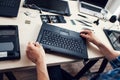 Keyboard of disassembled laptop, repairman pov