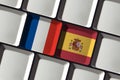 Keyboard with French France and Spanish Spain flag language learning translation