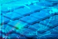 Keyboard with glowing cloud technology icons Royalty Free Stock Photo