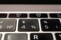 Keyboard of laptop by Apple, numbers