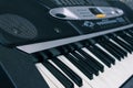 A synthesizer of his keys and speaker close-up. Musical instrument with keys Royalty Free Stock Photo