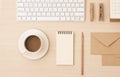 Keyboard, notebook. pencil, coffee, envelope on the wood desk. Flat lay