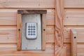 Keyboard number digicode code digital code security for access wooden home building open gate door Royalty Free Stock Photo