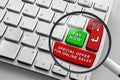 Keyboard with red and green online shopping theme buttons and magnifying glass Royalty Free Stock Photo