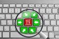 Keyboard with red and green online shopping theme buttons and magnifying glass Royalty Free Stock Photo