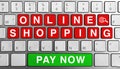 Keyboard with red and green online shopping theme buttons and magnifying glass Royalty Free Stock Photo