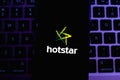 Keyboard and smart phone with the Hotstar logo