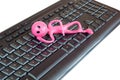 Keyboard with smiley toy, isolated