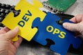 Keyboard sticker DevOps. DevOps Concept for software engineering culture and practice of software development and operation