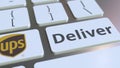 Keyboard with UPS company logo and Deliver text on the keys. Editorial conceptual 3D rendering