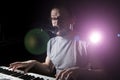 keyboarder is playing and singing. Royalty Free Stock Photo