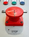 Keyed Emergency Stop Button on an Industrial Control Panel Royalty Free Stock Photo