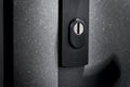 Keyhole in black metalic door Royalty Free Stock Photo