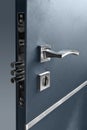 Keyhole, Doorhandle And Bolts At Dark Blue Metallic Door With Lock Royalty Free Stock Photo