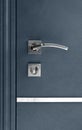 Keyhole, Doorhandle And Bolts At Dark Blue Metallic Door With Lock