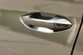 Keyless entry car door handle with keyless go touch sensor. Automatic opening of a car door without a key. Car door handle. Access Royalty Free Stock Photo