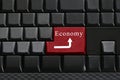 Keypad of black keyboard and have text Economy on enter button. Royalty Free Stock Photo