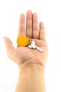 Keys and circle yellow key card in hand Royalty Free Stock Photo