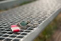 Keys forgotten on metal bench outdoors. Lost and found