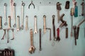 Keys in the garage tools. Old tools hanging on wall in workshop , Tool shelf against a wall  in the garage Royalty Free Stock Photo