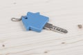 Keys with house shaped blue keyring
