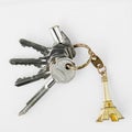 Keys with key chain of mini eiffel tower from Paris, France on a Royalty Free Stock Photo