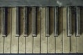 Keys of the old piano in abandoned flat