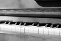 The keys of an old piano closeup. Musical background black and white Royalty Free Stock Photo