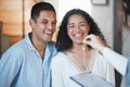 Keys. realtor and a home owner couple in their apartment after payment or investment in a property asset. Real estate Royalty Free Stock Photo