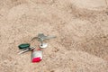 Keys on sand, space for text. Lost and found Royalty Free Stock Photo