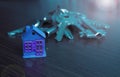 Keys and a small toy house on a wooden background. The concept of buying, selling, renting your own home in the real estate market Royalty Free Stock Photo