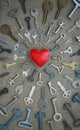 Keys strive to the red heart, square conceptual photo