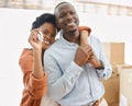 The keys to a new beginning. a young couple showing the keys to their new house. Royalty Free Stock Photo