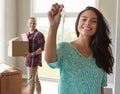 The keys to their dream home. a young couple moving into their new home. Royalty Free Stock Photo