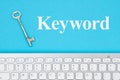 Keyword message with gray keyboard with a vintage skeleton key