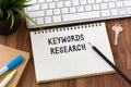 Keywords research words on notebook Royalty Free Stock Photo