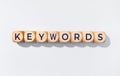 Keywords word on wooden blocks isolated on gray Royalty Free Stock Photo