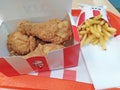 KFC french fries potato and chicken legs Royalty Free Stock Photo