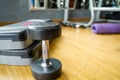 10KG dumpbell on wooden floor in fitness center Royalty Free Stock Photo
