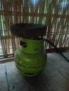 3kg gas cylinder and a mortar on it to hold the regulator