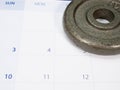 weight plate and a calander Royalty Free Stock Photo