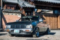 Khabarovsk, Russia - August 28, 2016 : car Nissan Datsun pickup truck on the street, around the house