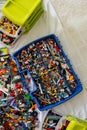Khabarovsk, Russia, February 18, 2022. Heap small multicolored Lego details sorting plastic cases