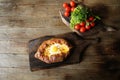 Khachapuri Adjara traditional Georgian dishes. Baked bread stuffed with cheese and eggs.