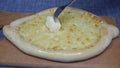 Khachapuri, Georgian cheese dough, greased with butter